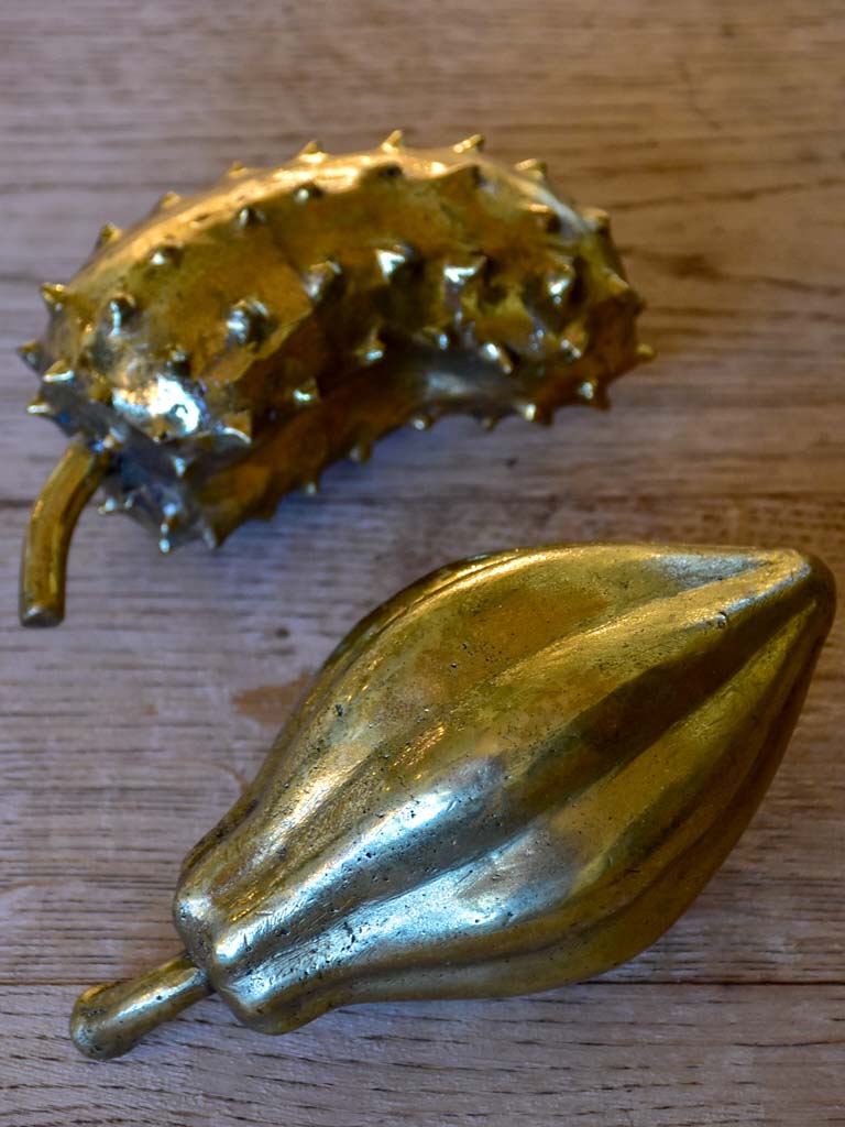 Two bronze mid-century fruit sculptures