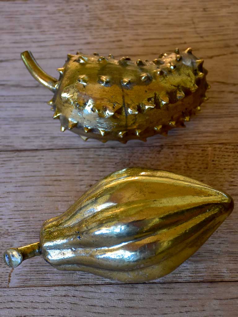 Two bronze mid-century fruit sculptures