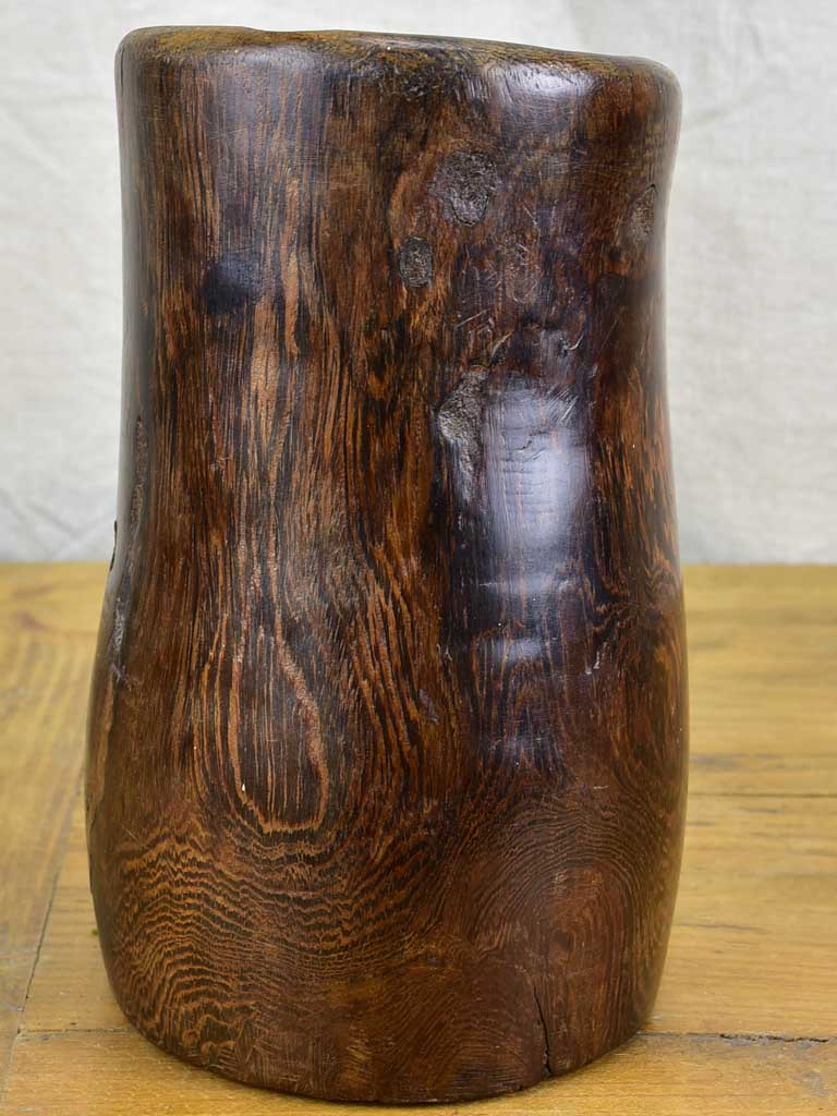 Primitive carved wooden pitcher