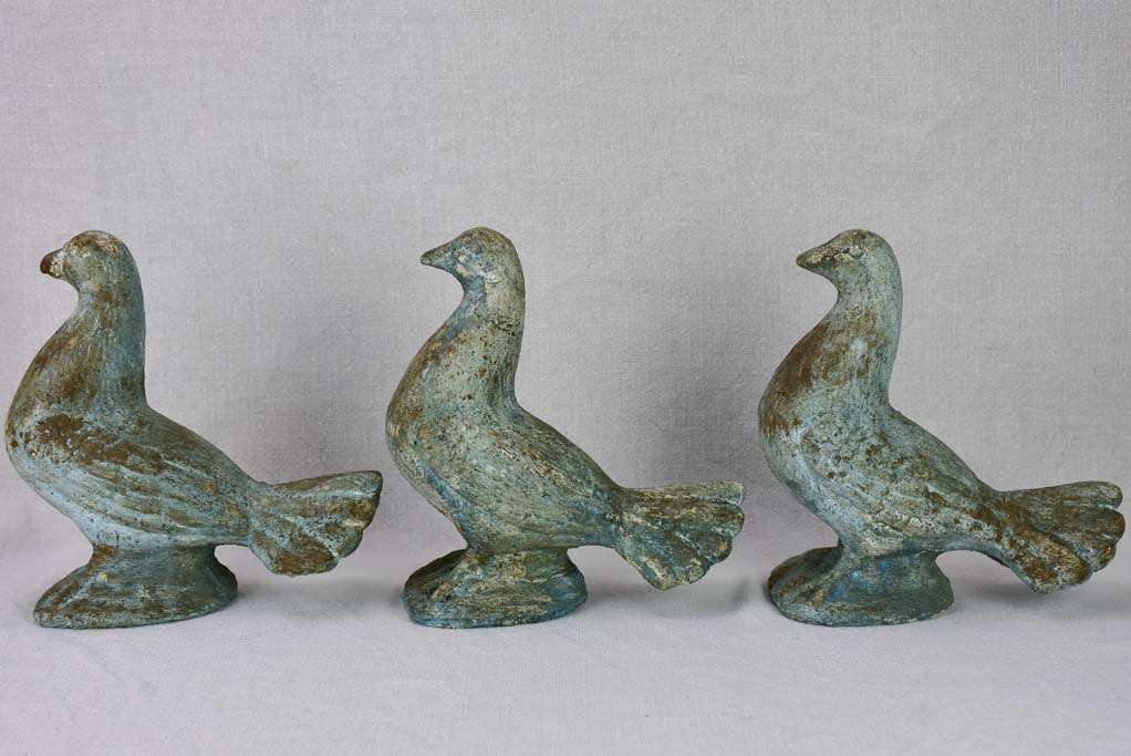 Three vintage French dove sculptures with blue patina