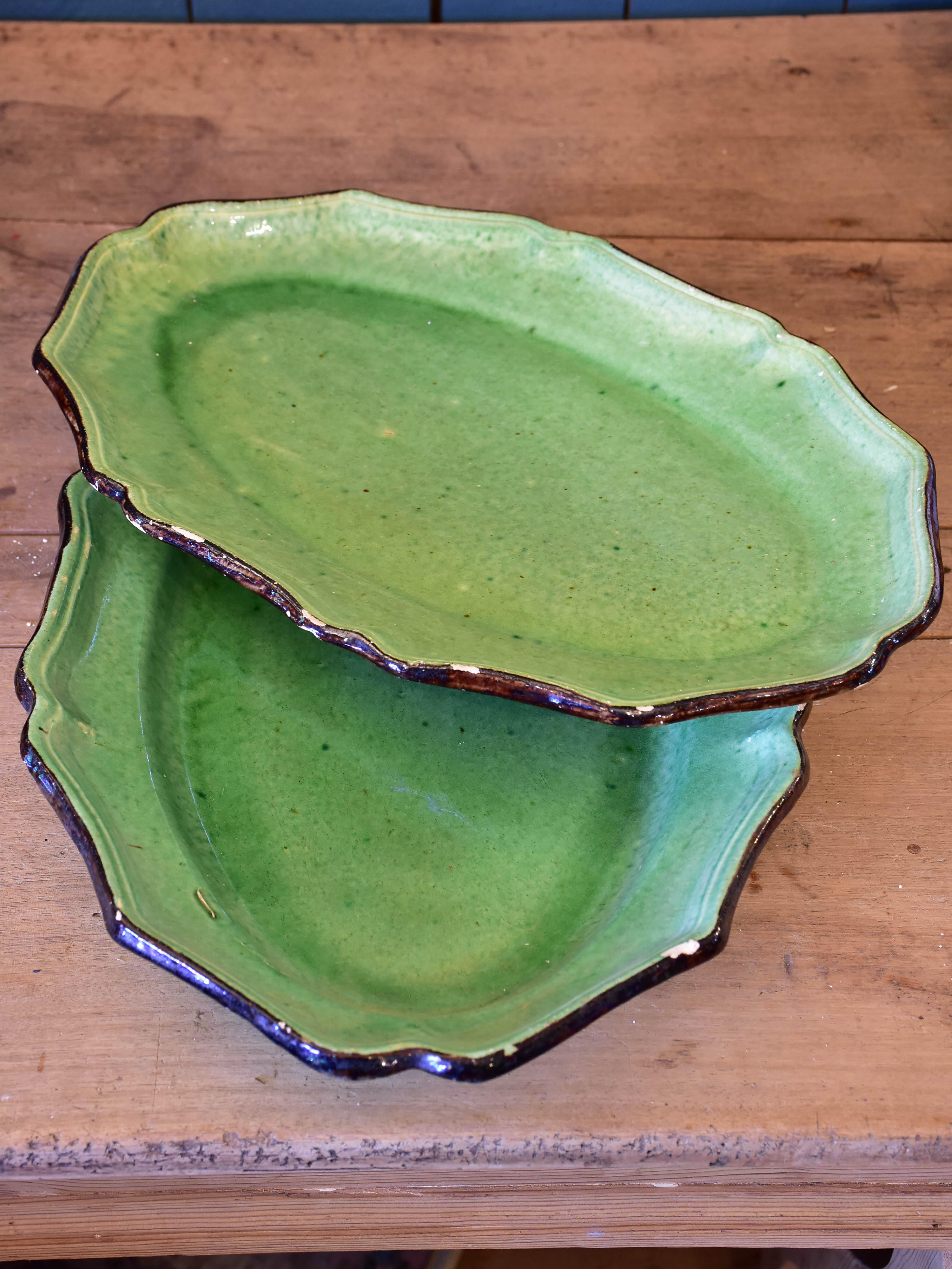 Two green glazed French platters from Dieulefit