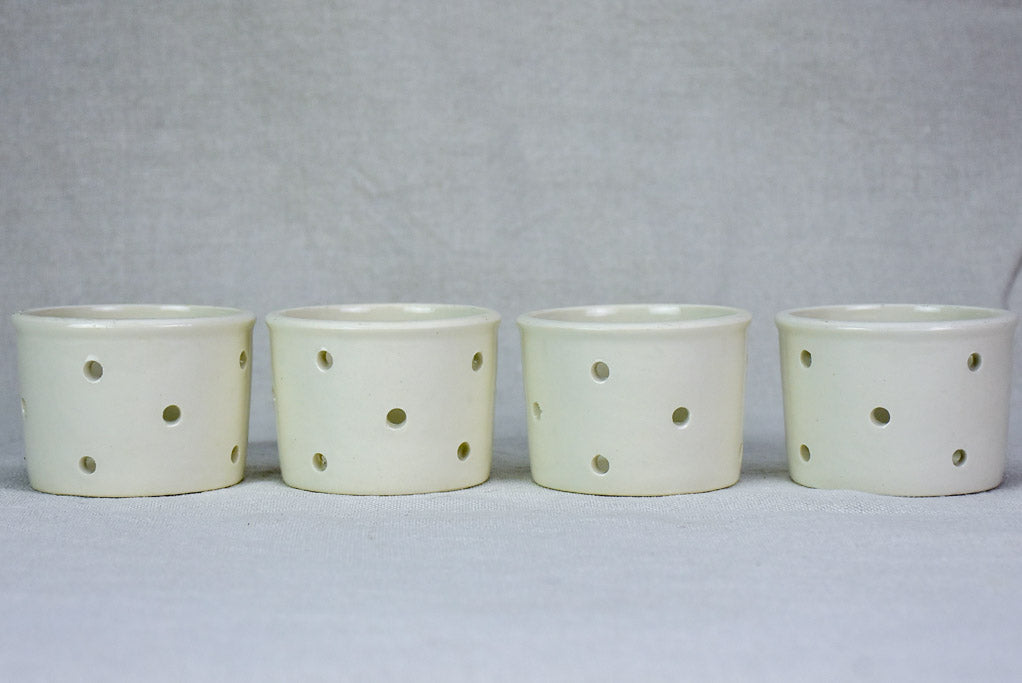 Collection of four white cheese molds #1