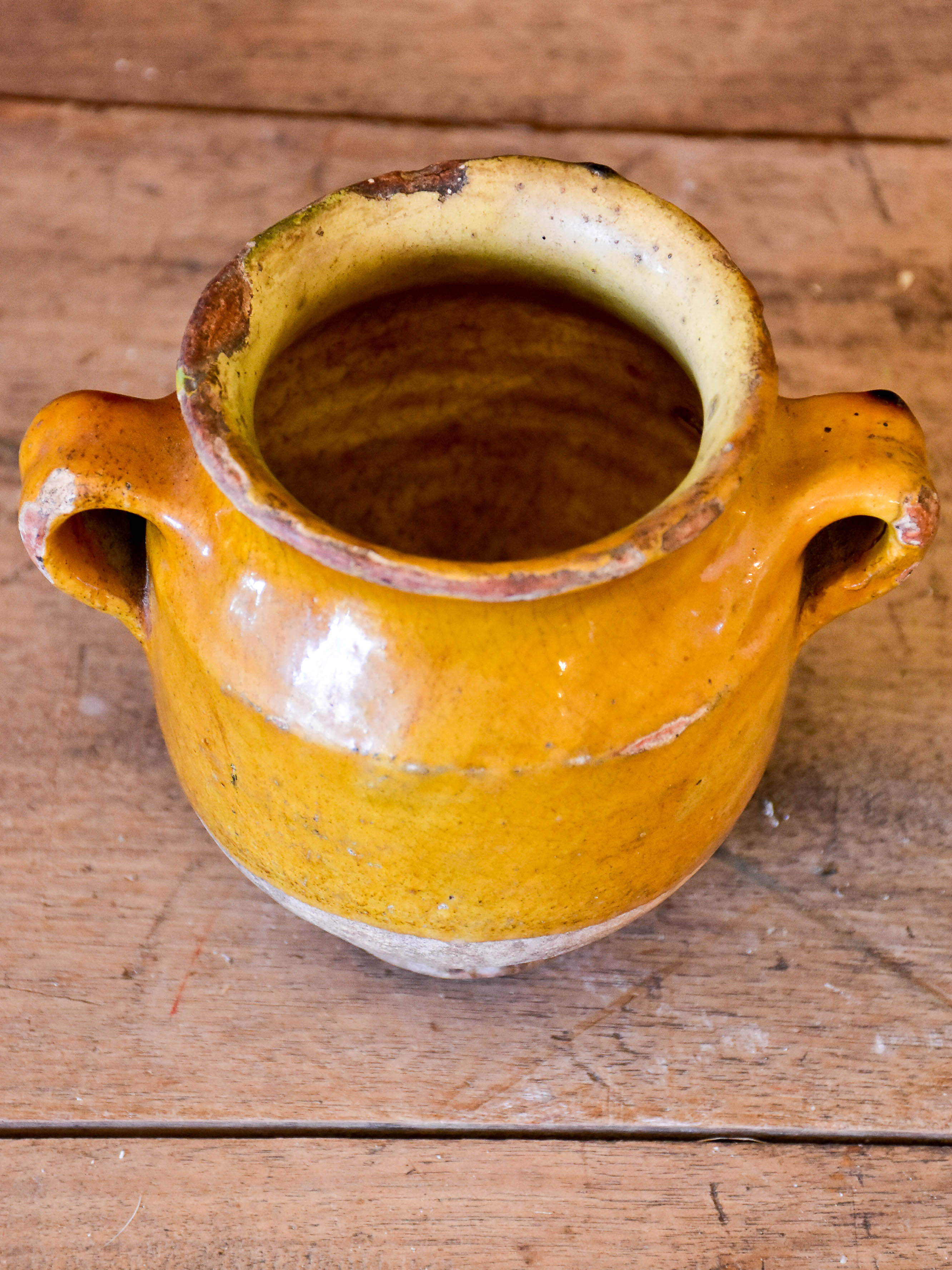 Very small antique French confit pot with yellow glaze