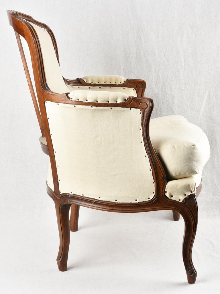 Louis XV style armchair with beige upholstery