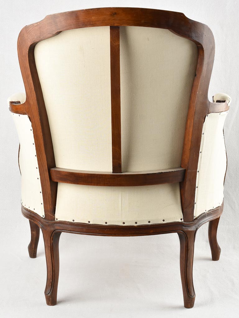 Louis XV style armchair with beige upholstery