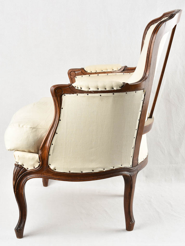 Louis XV style armchair with beige upholstery