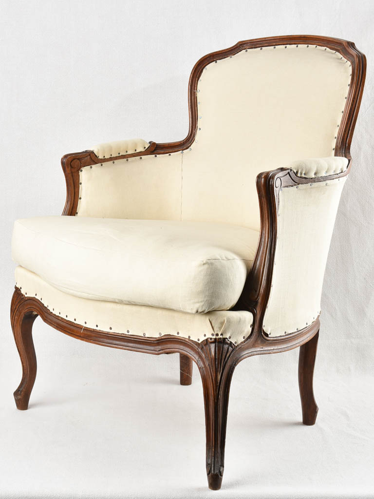 Louis XV style armchair with beige upholstery