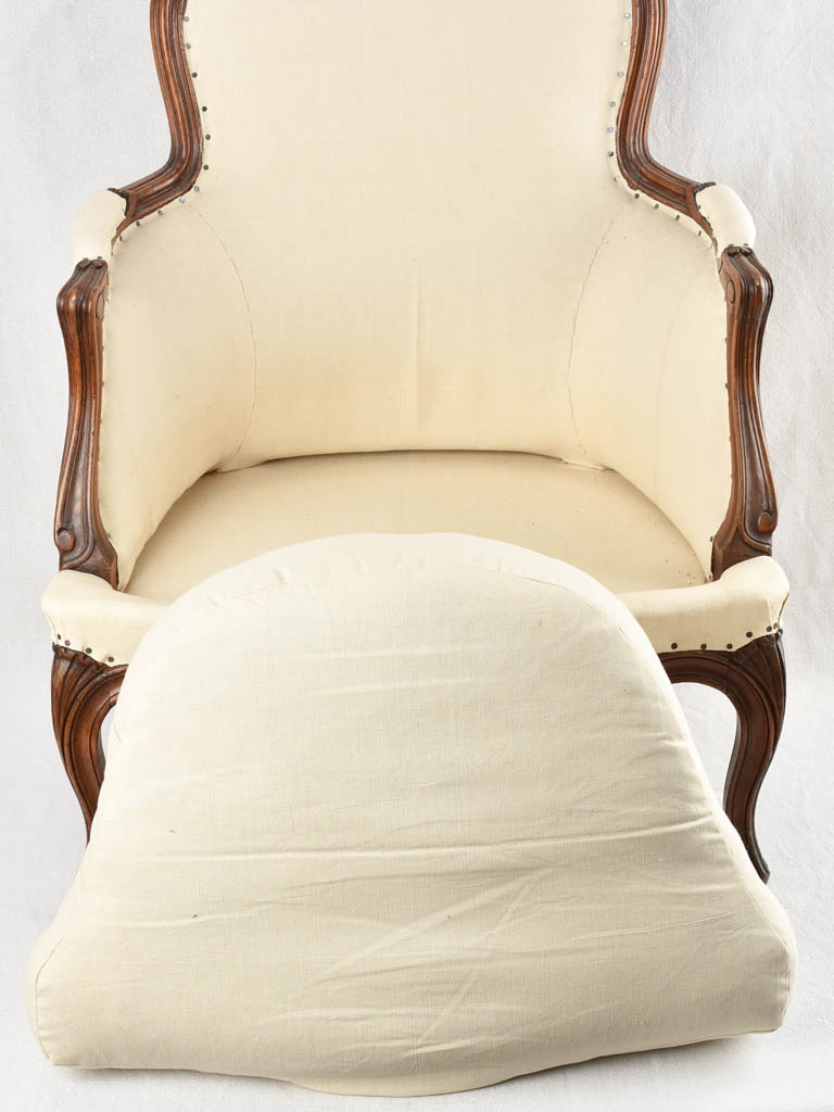 Louis XV style armchair with beige upholstery