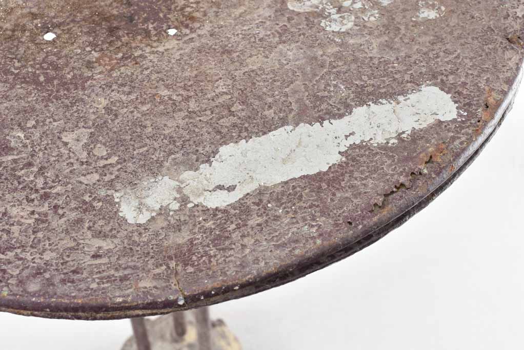 Burgundy / violet bistro table with claw feet