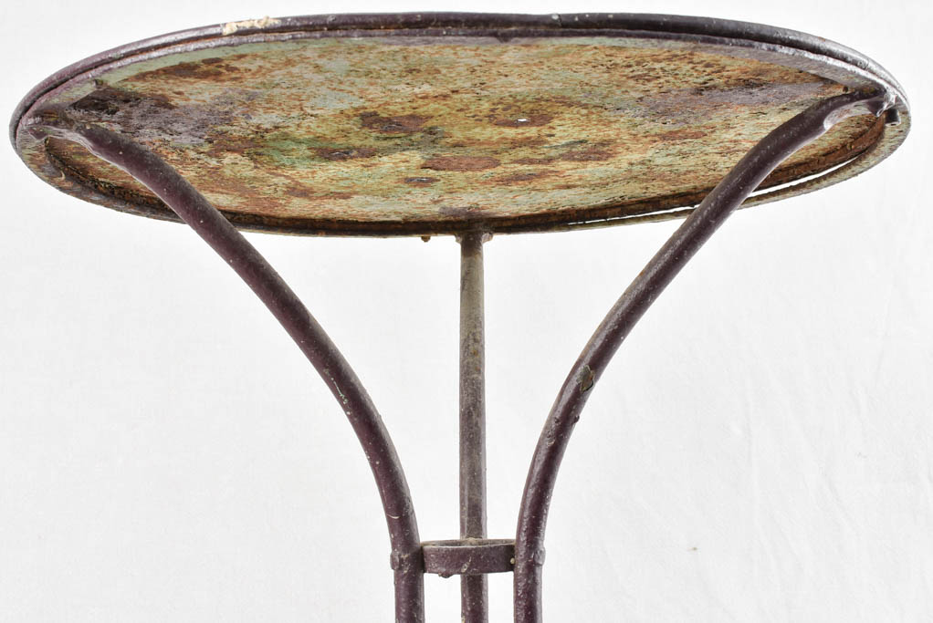 Burgundy / violet bistro table with claw feet