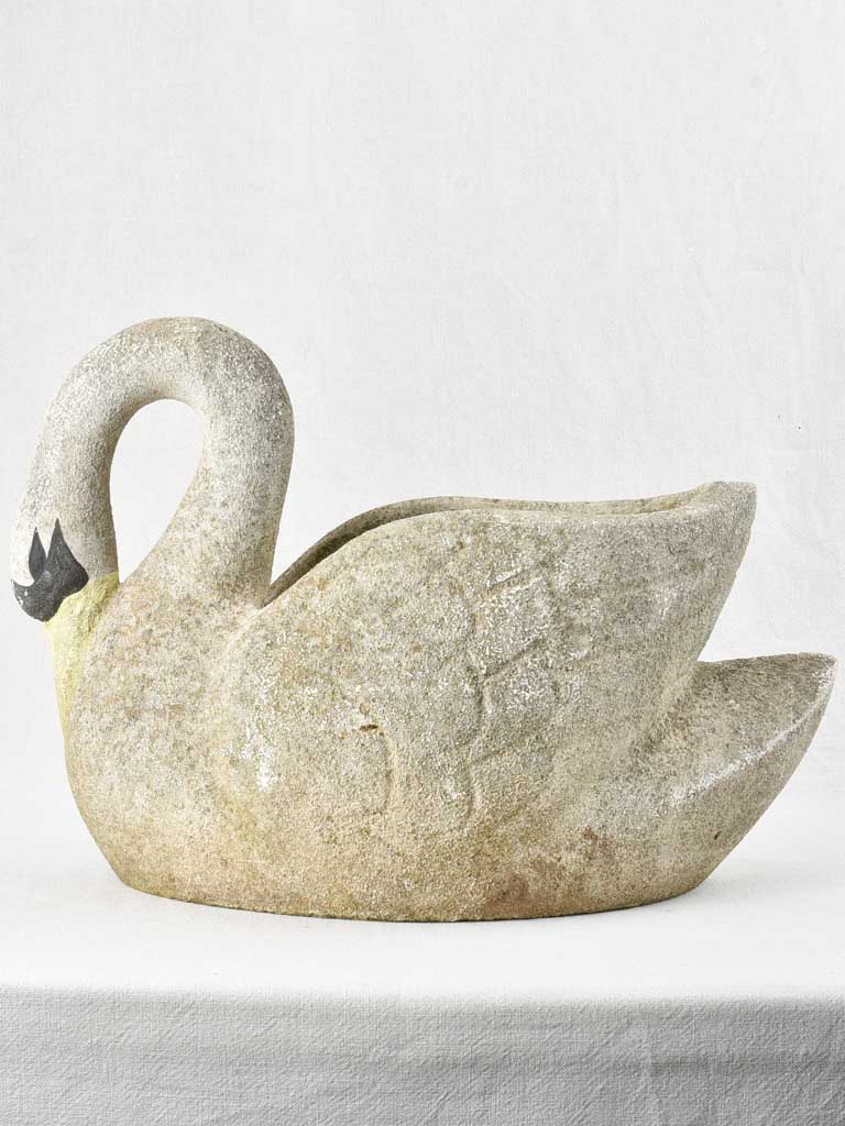 Vintage concrete swan planter with painted face and beak