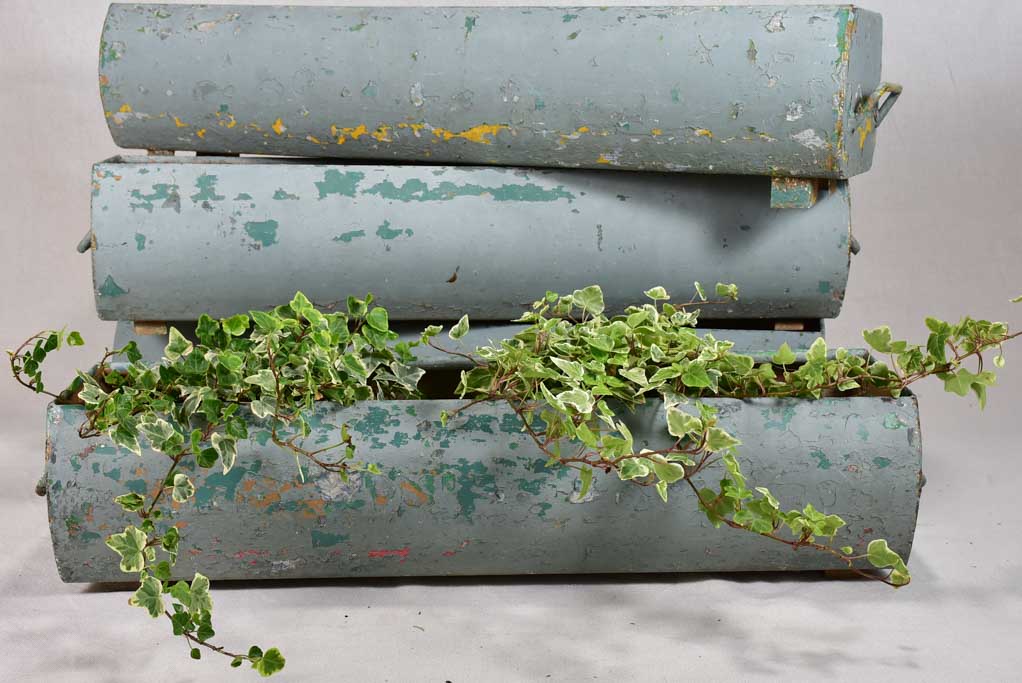 Four mid-century French window planters with blue patina 33½"