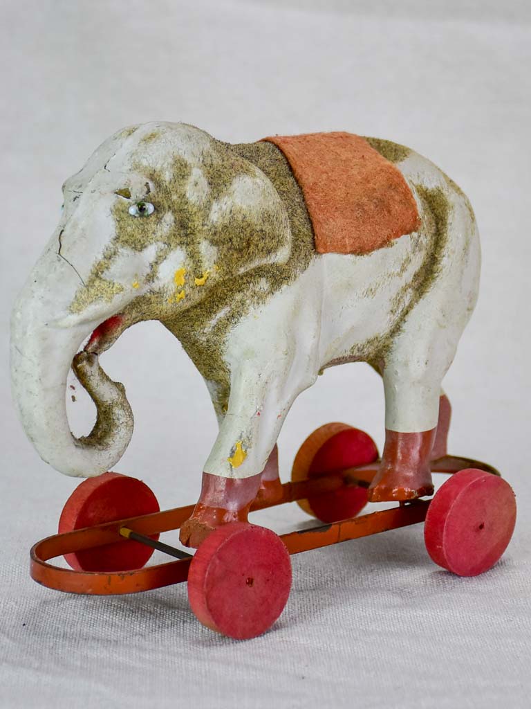 Antique French toy elephant on wheels - small