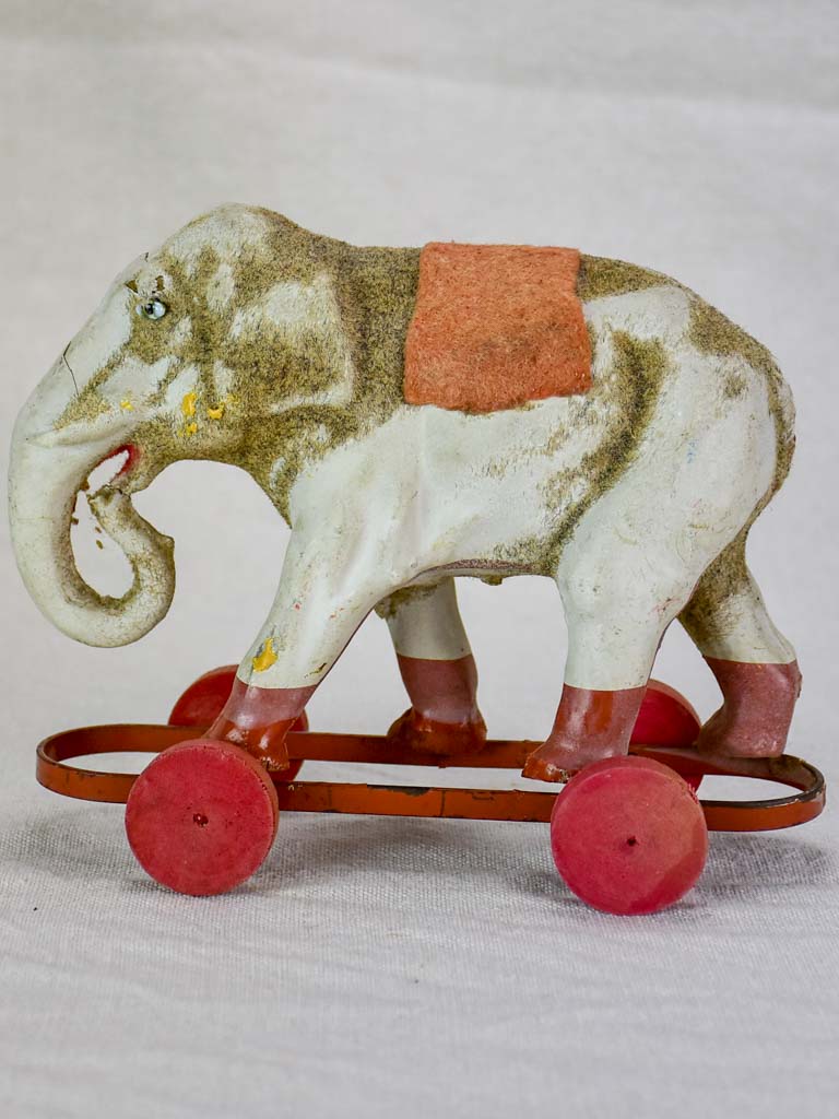 Antique French toy elephant on wheels - small