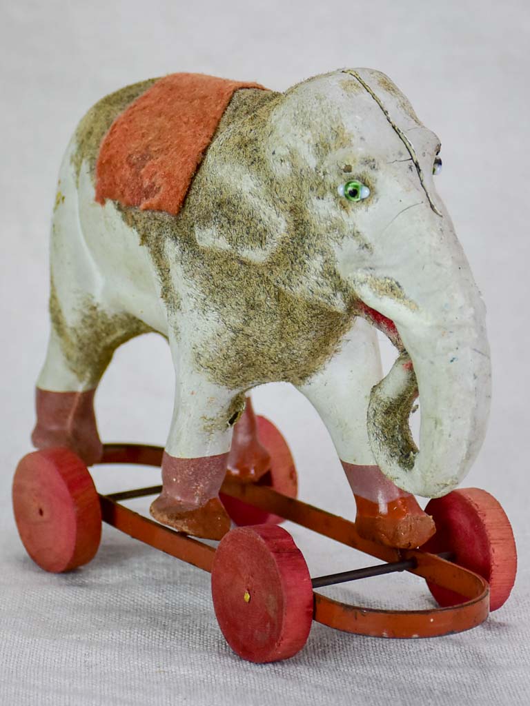 Antique French toy elephant on wheels - small