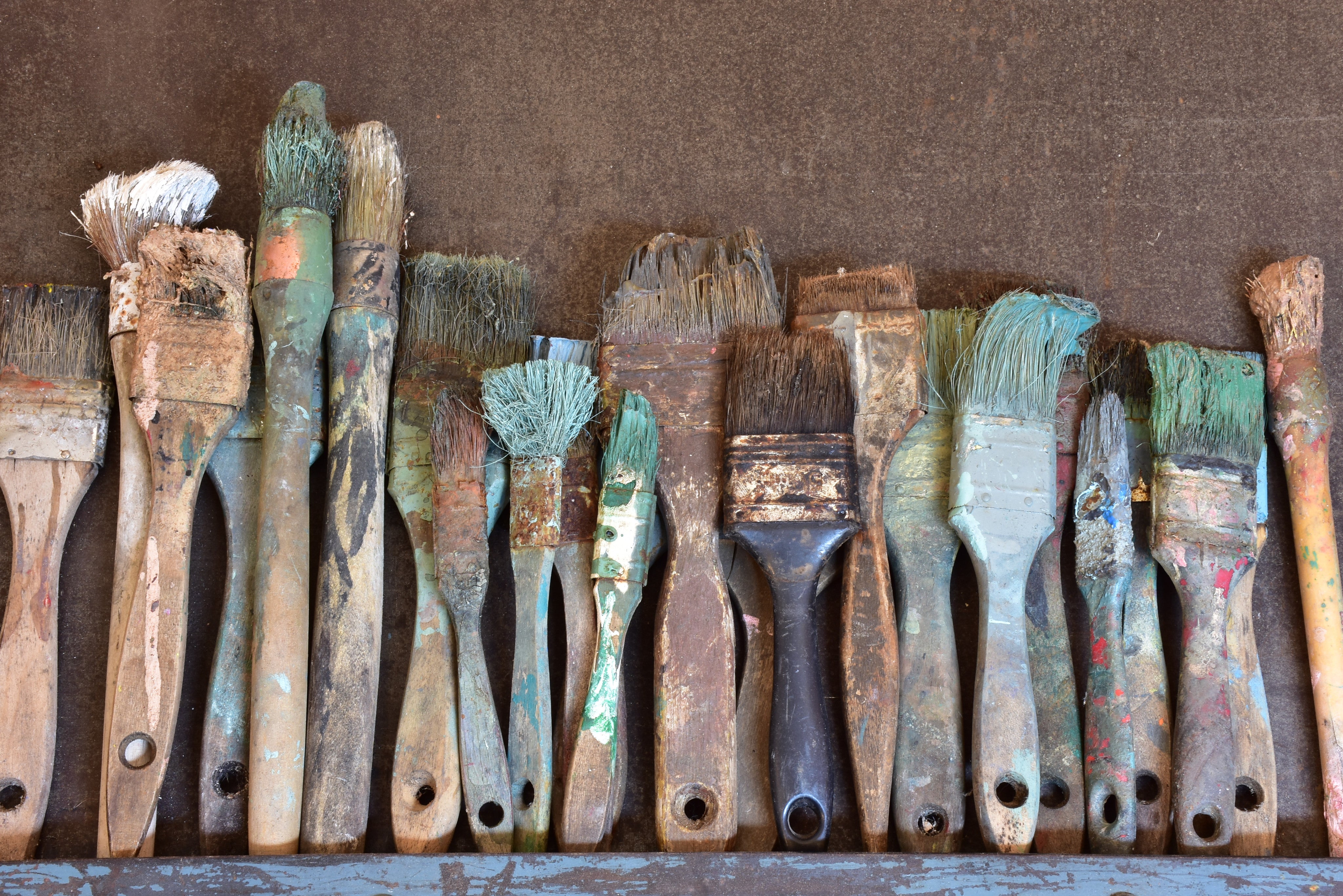 Rustic paint brushes and artist's palette