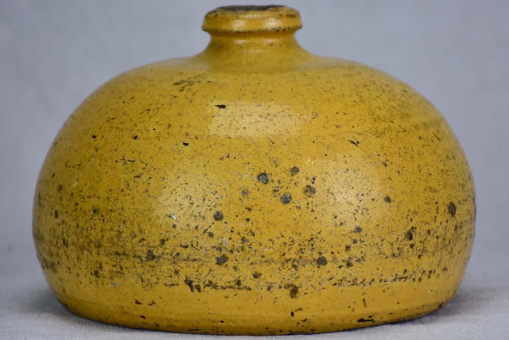 19th Century French ceramic hot water bottle with yellow glaze 7"