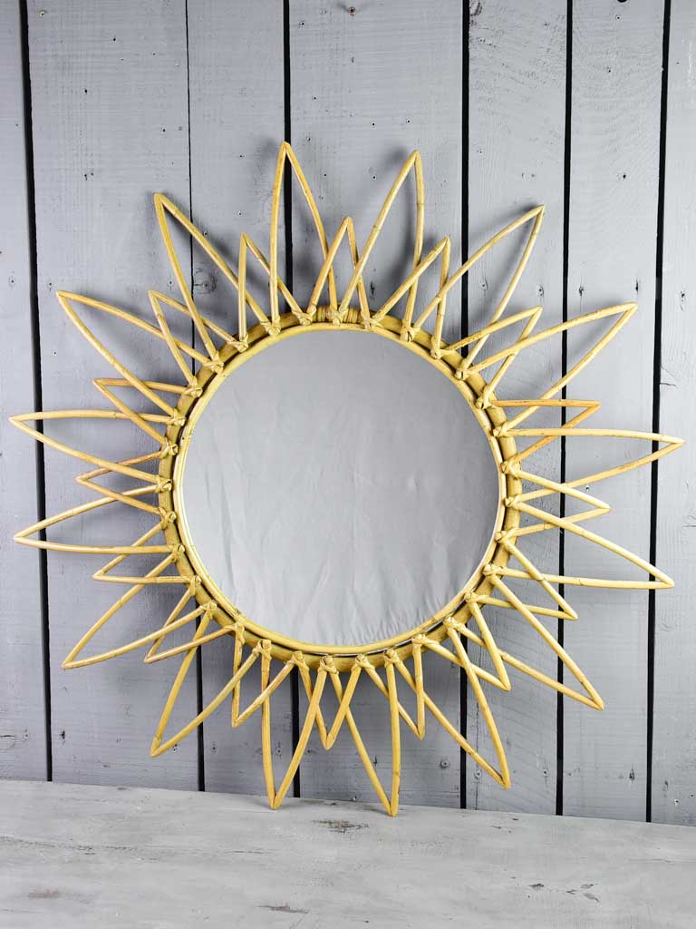 Vintage French cane sunburst mirror 35½"