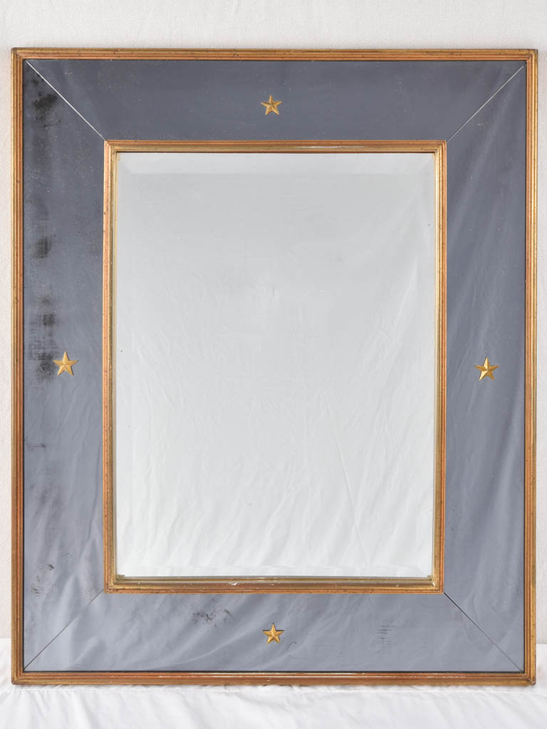 Vintage mirror with smokey glass frame and stars 28" x 33¾"