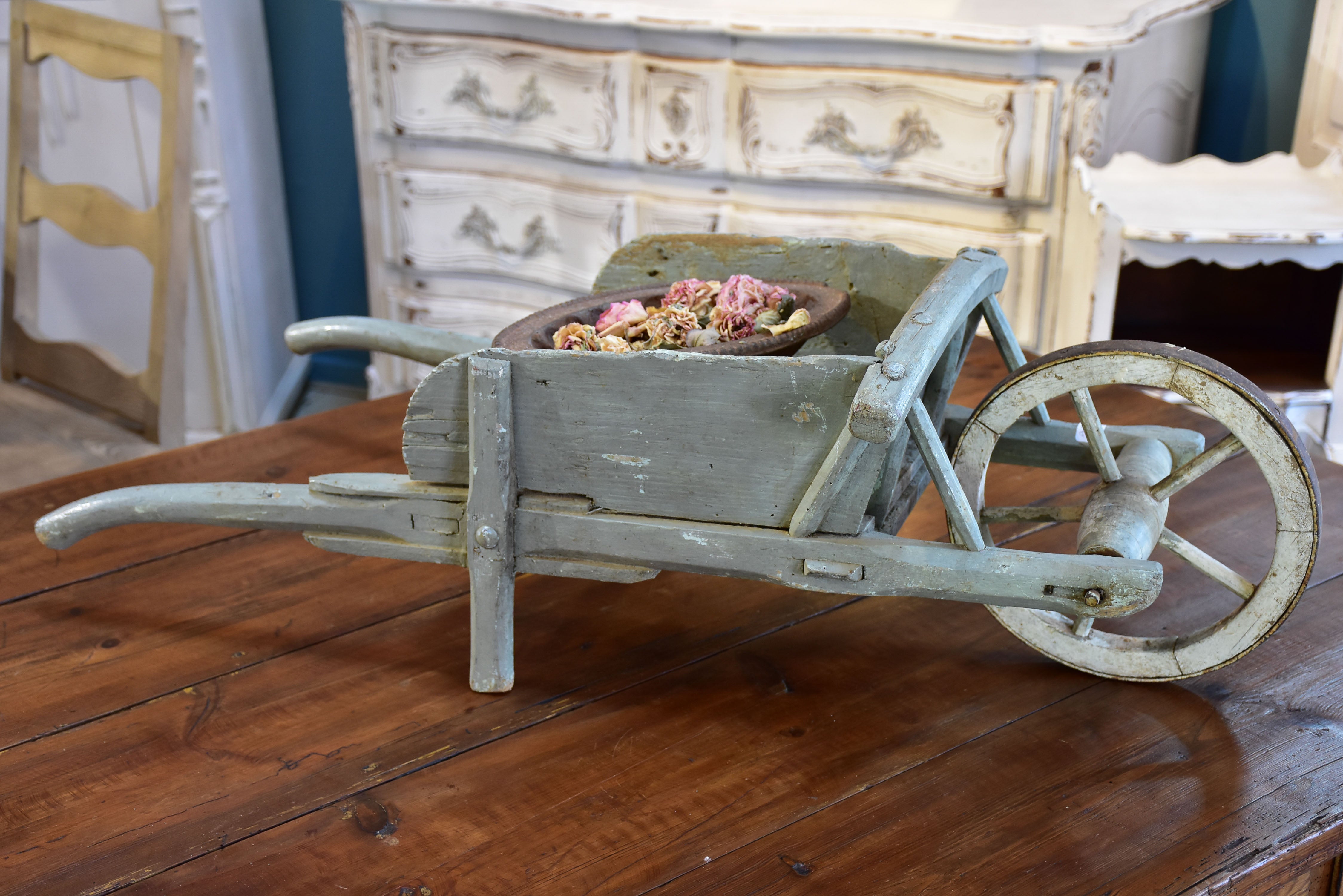 Small French wooden wheelbarrow