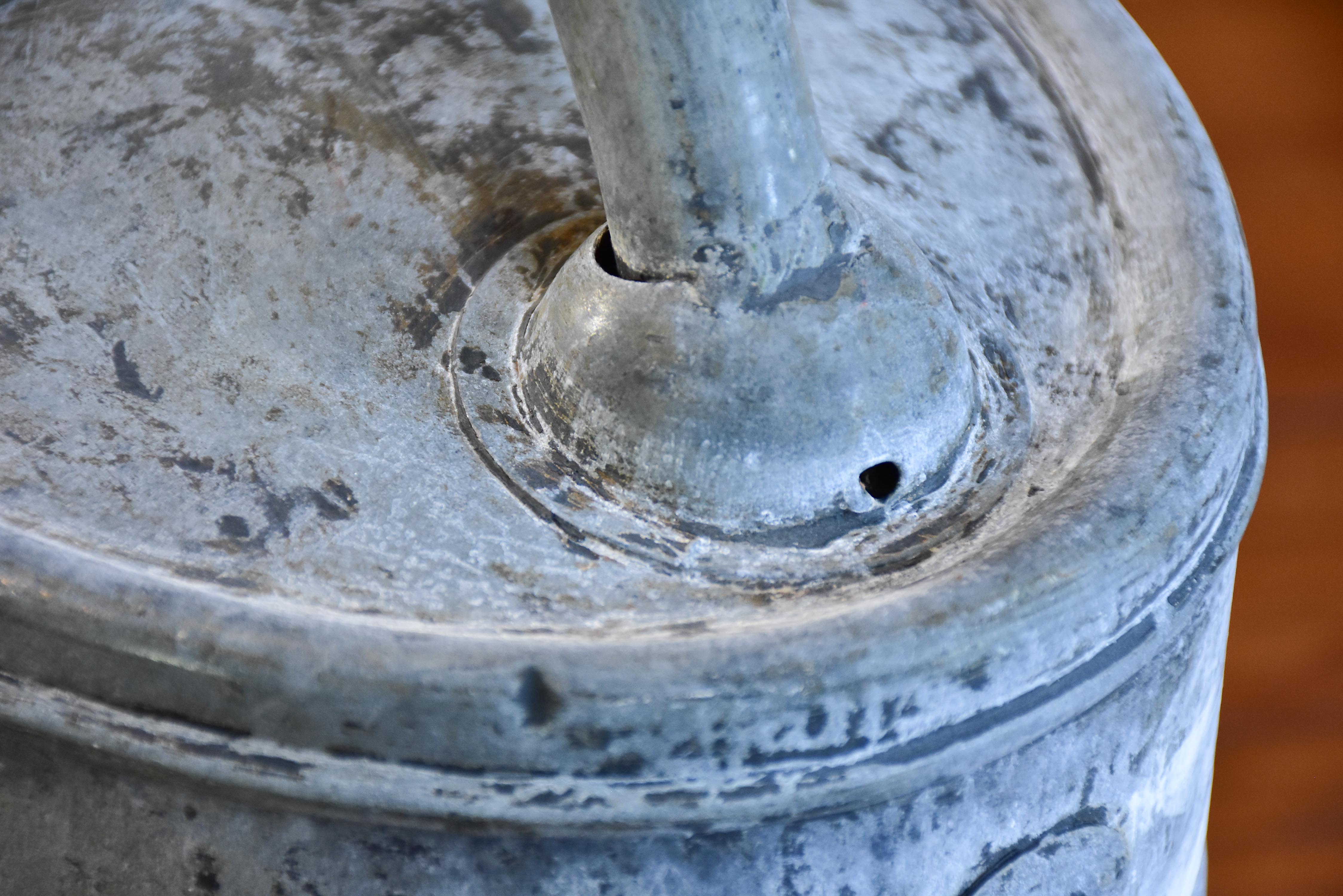 Vintage French watering can with rose head