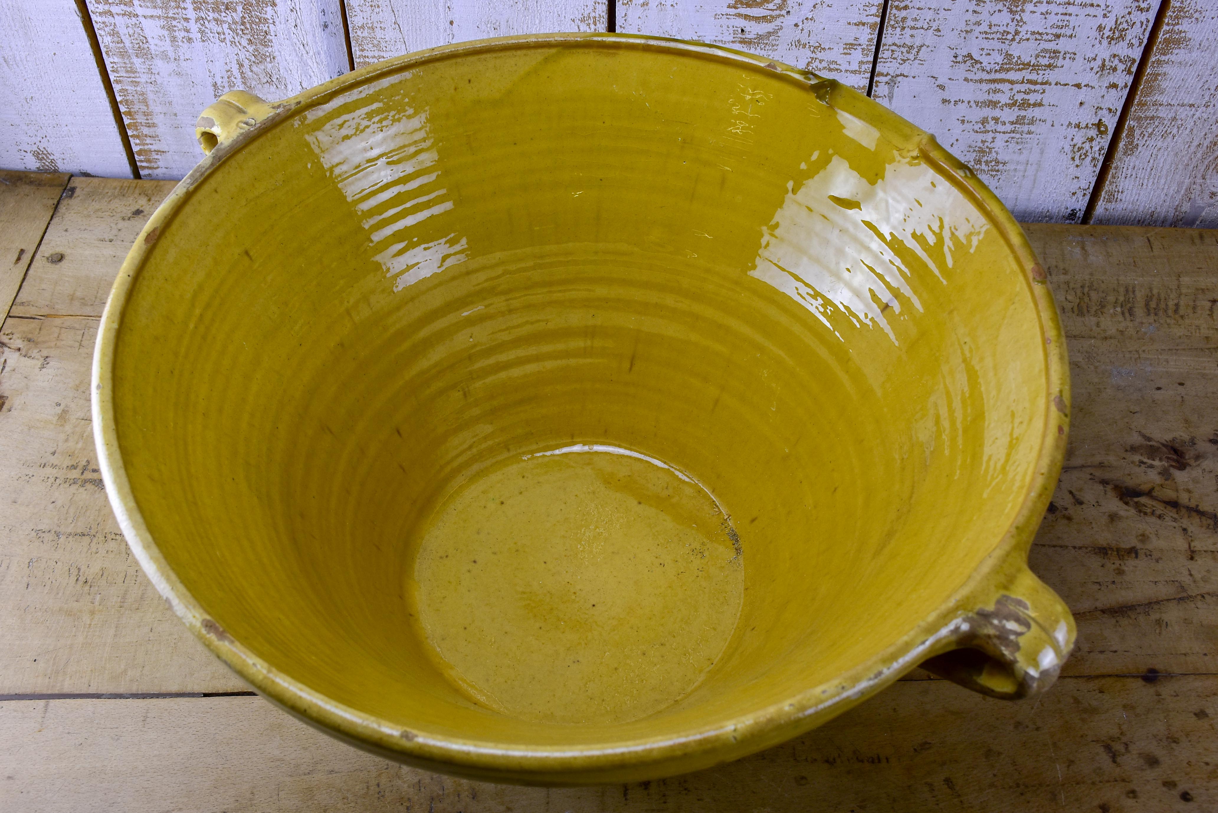 Antique French deep preserving bowl with yellow glaze