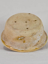 Antique French teracotta cheese strainer with yellow glaze