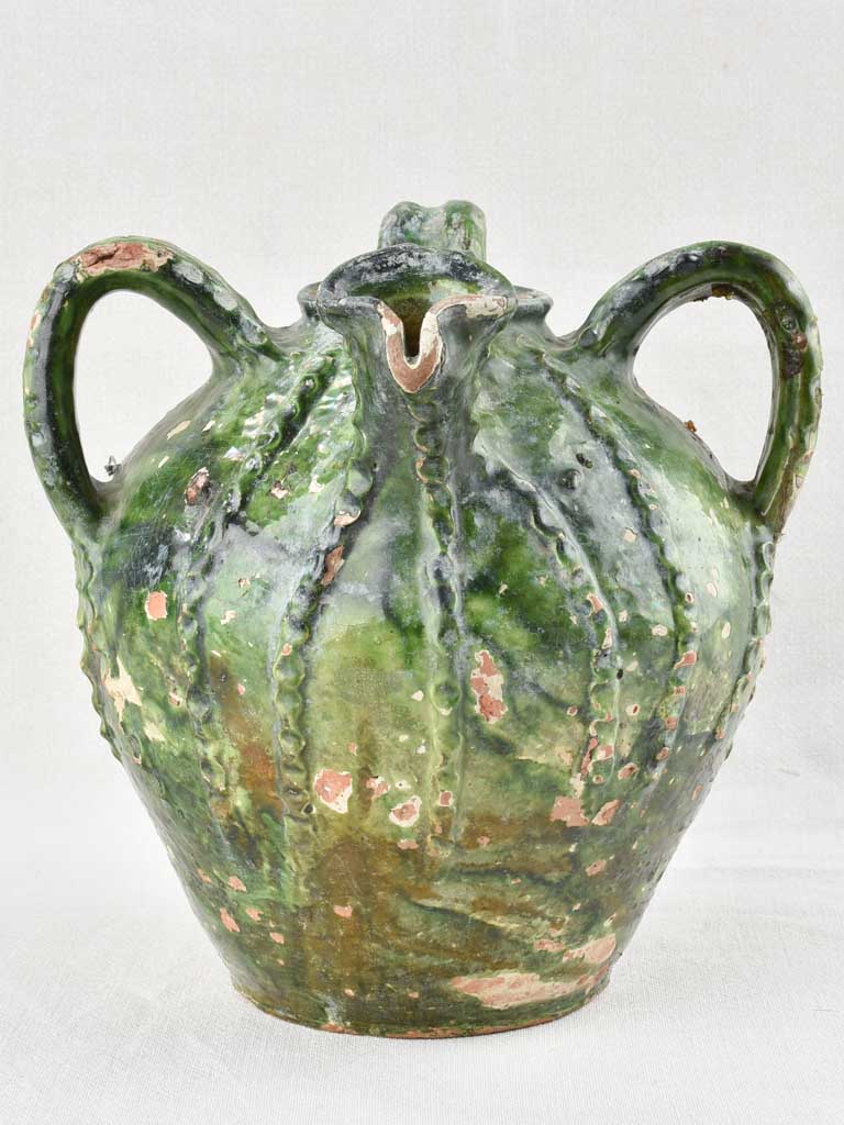 18th century walnut oil jar with green patina 12½"