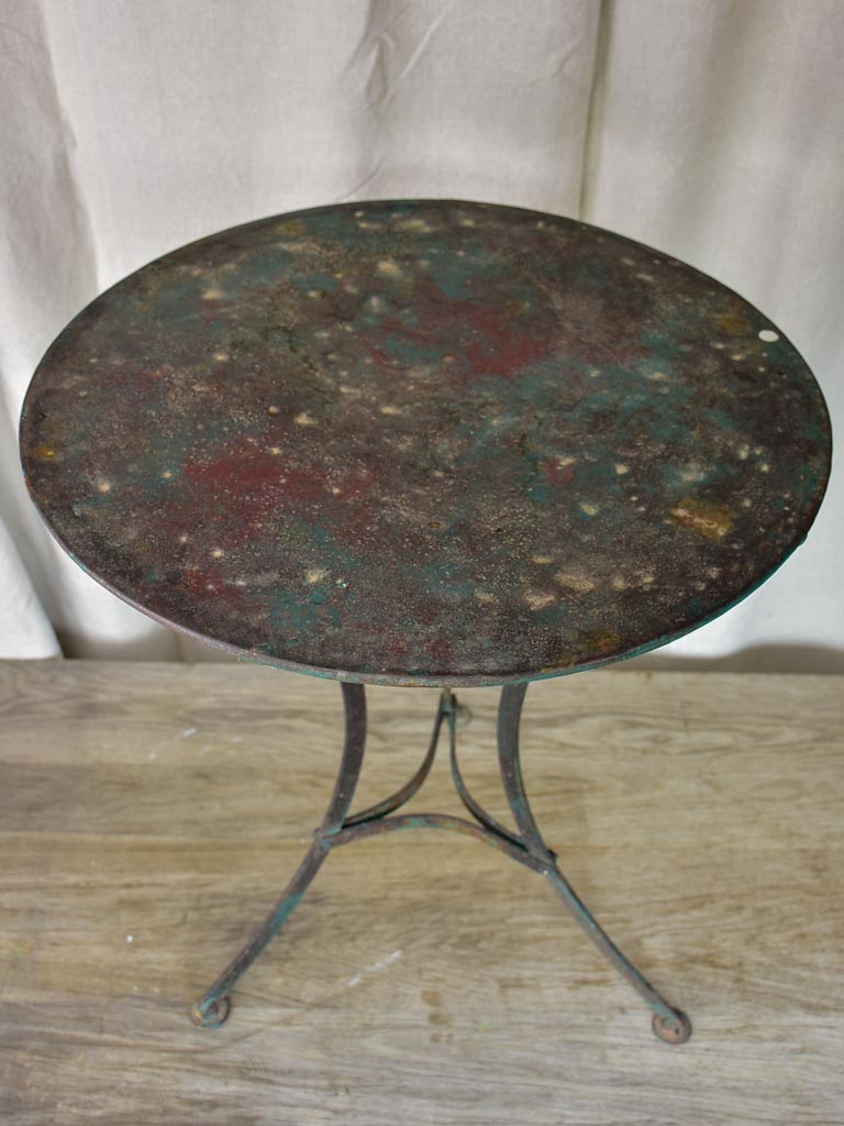 Round antique French garden table with green patina