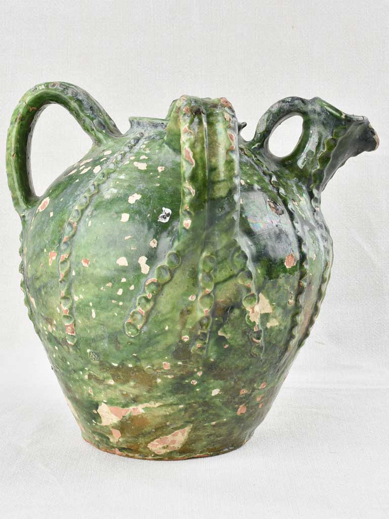 18th century walnut oil jar with green patina 12½"