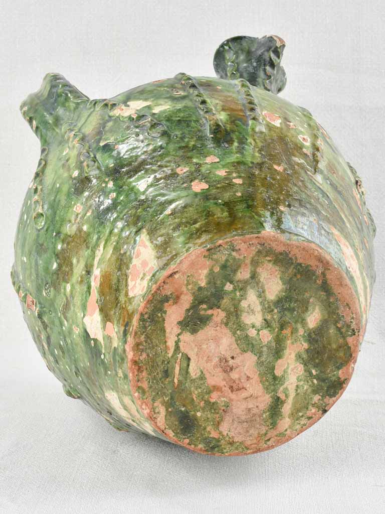 18th century walnut oil jar with green patina 12½"