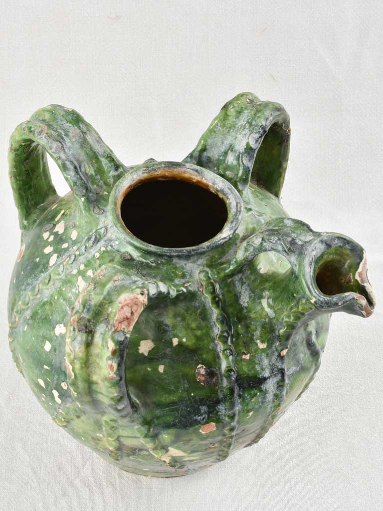 18th century walnut oil jar with green patina 12½"