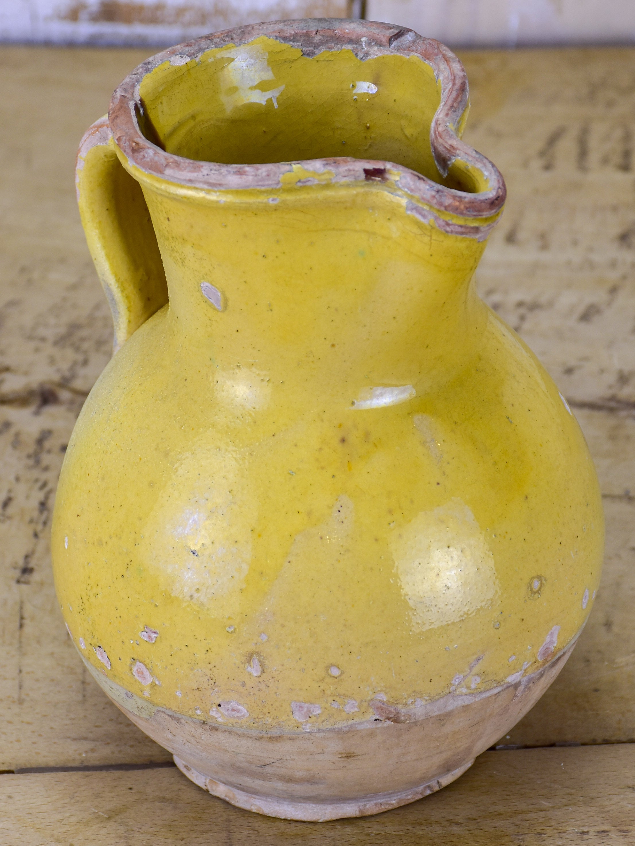 19th Century French pitcher with yellow glaze