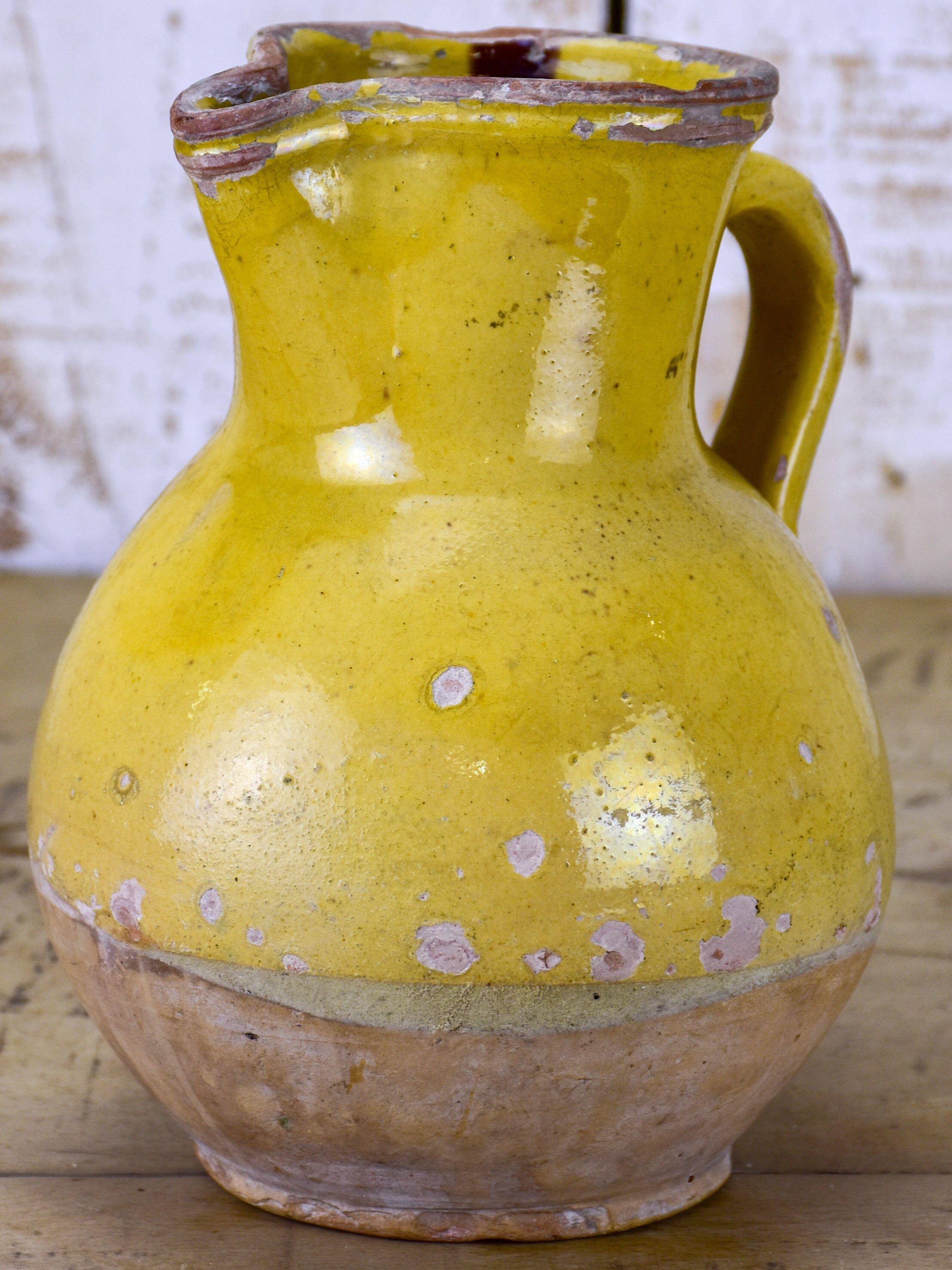 19th Century French pitcher with yellow glaze