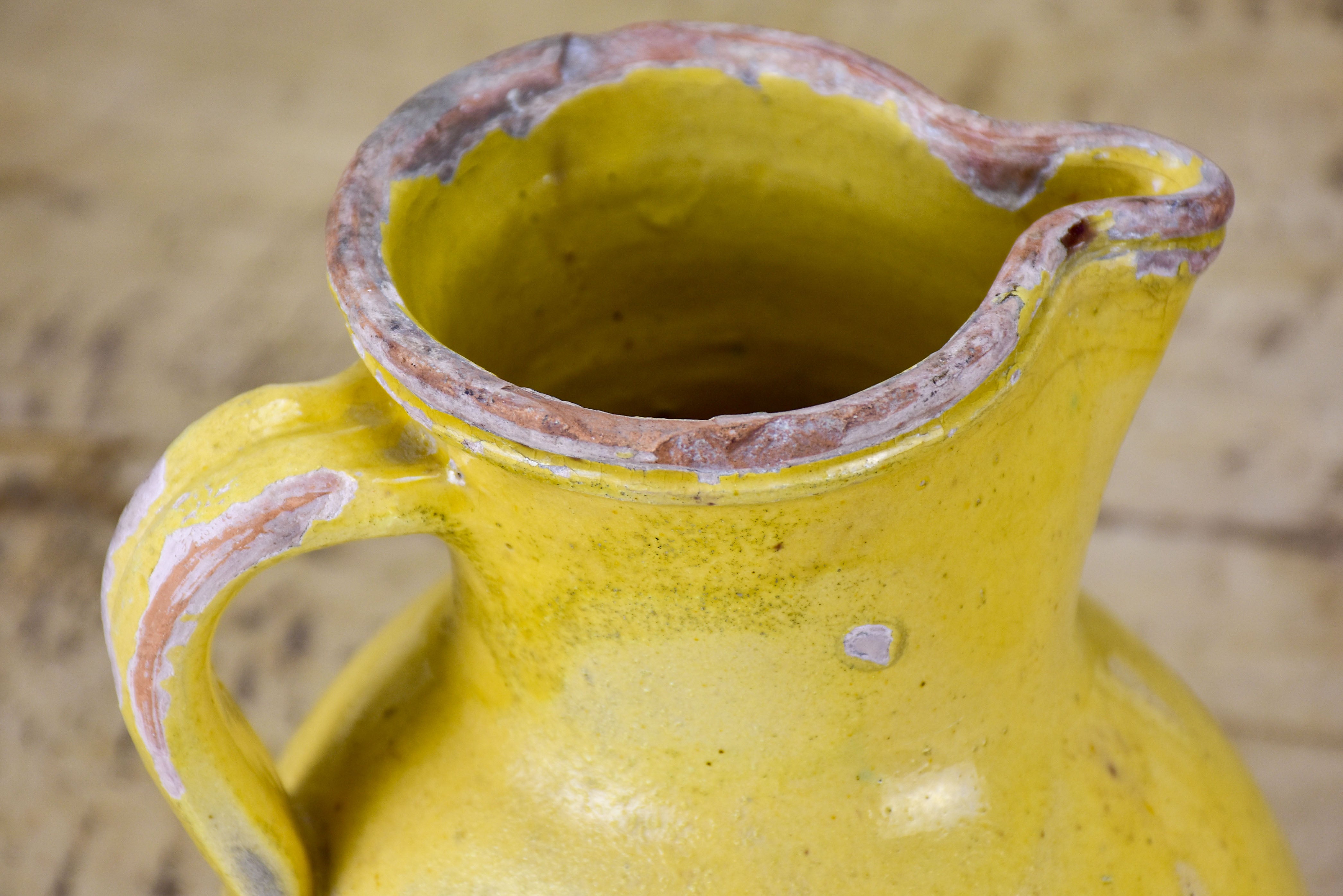 19th Century French pitcher with yellow glaze