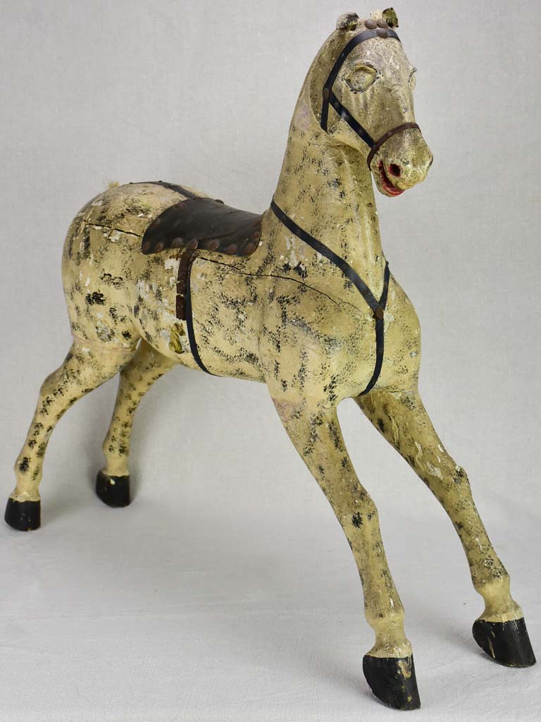 Late 19th Century French toy horse with leather saddle 24½"