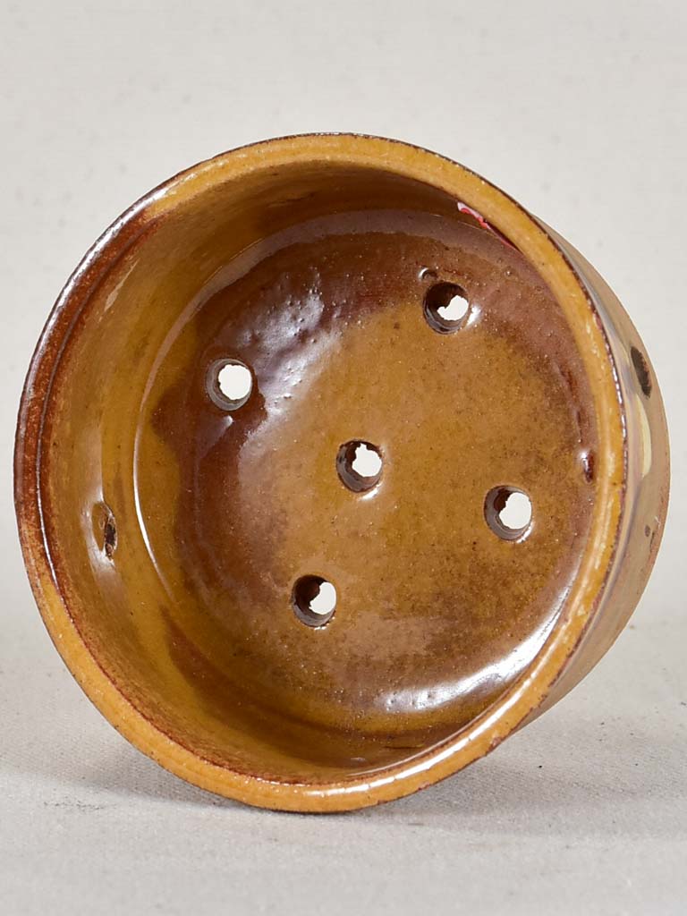 Antique French clay cheese strainer with brown glaze