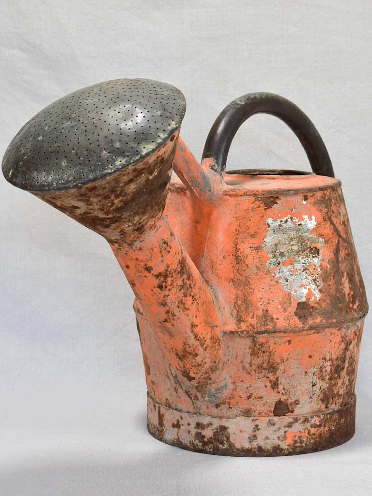 Nineteenth-century French watering can with orange patina