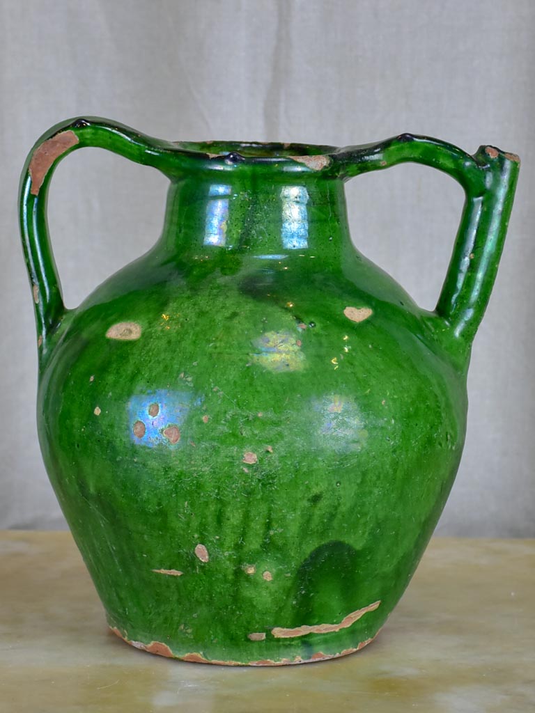 Antique French water jug with green glaze