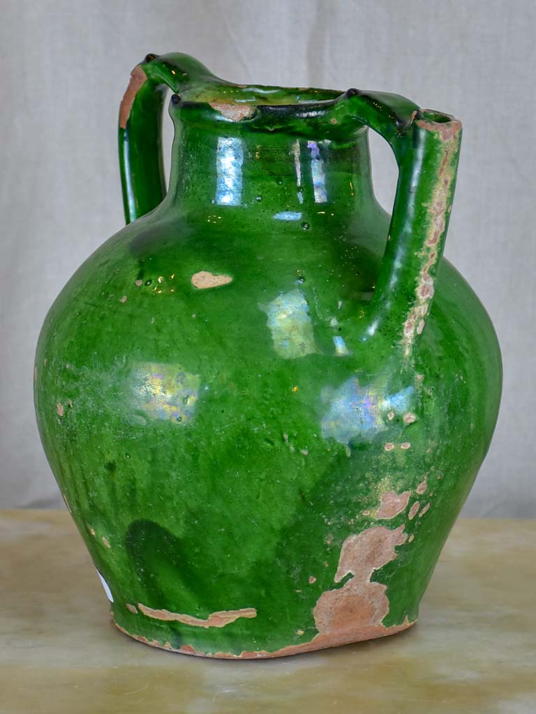 Antique French water jug with green glaze