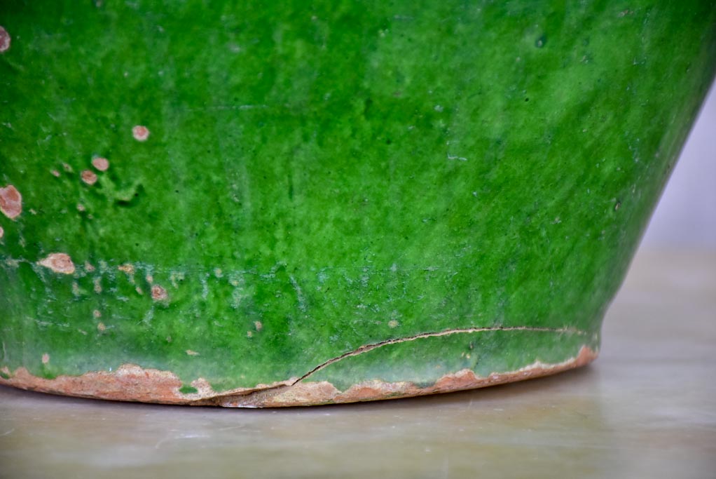 Antique French water jug with green glaze