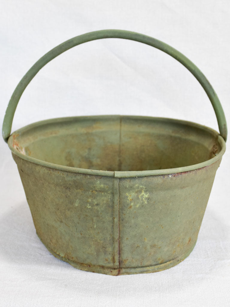 Vintage French metal harvest basket with green patina - early twentieth-century