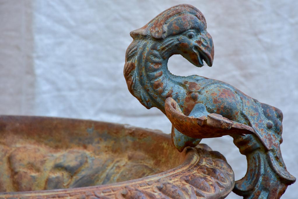 Pair of early 20th Century cast iron urns with Phoenix handles