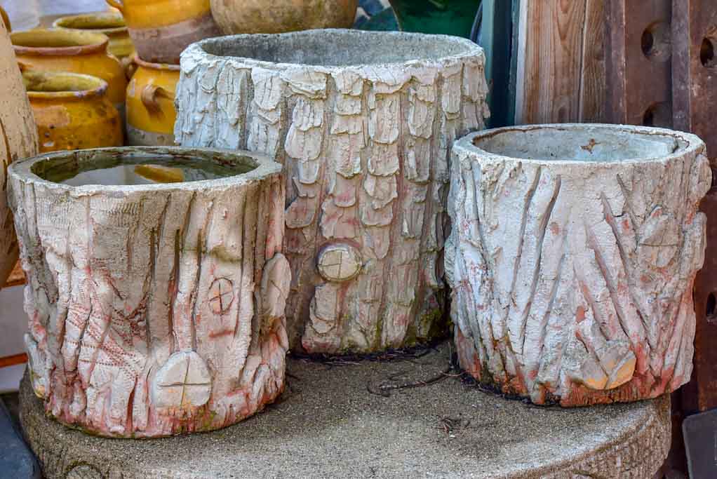 Three faux bois garden planters