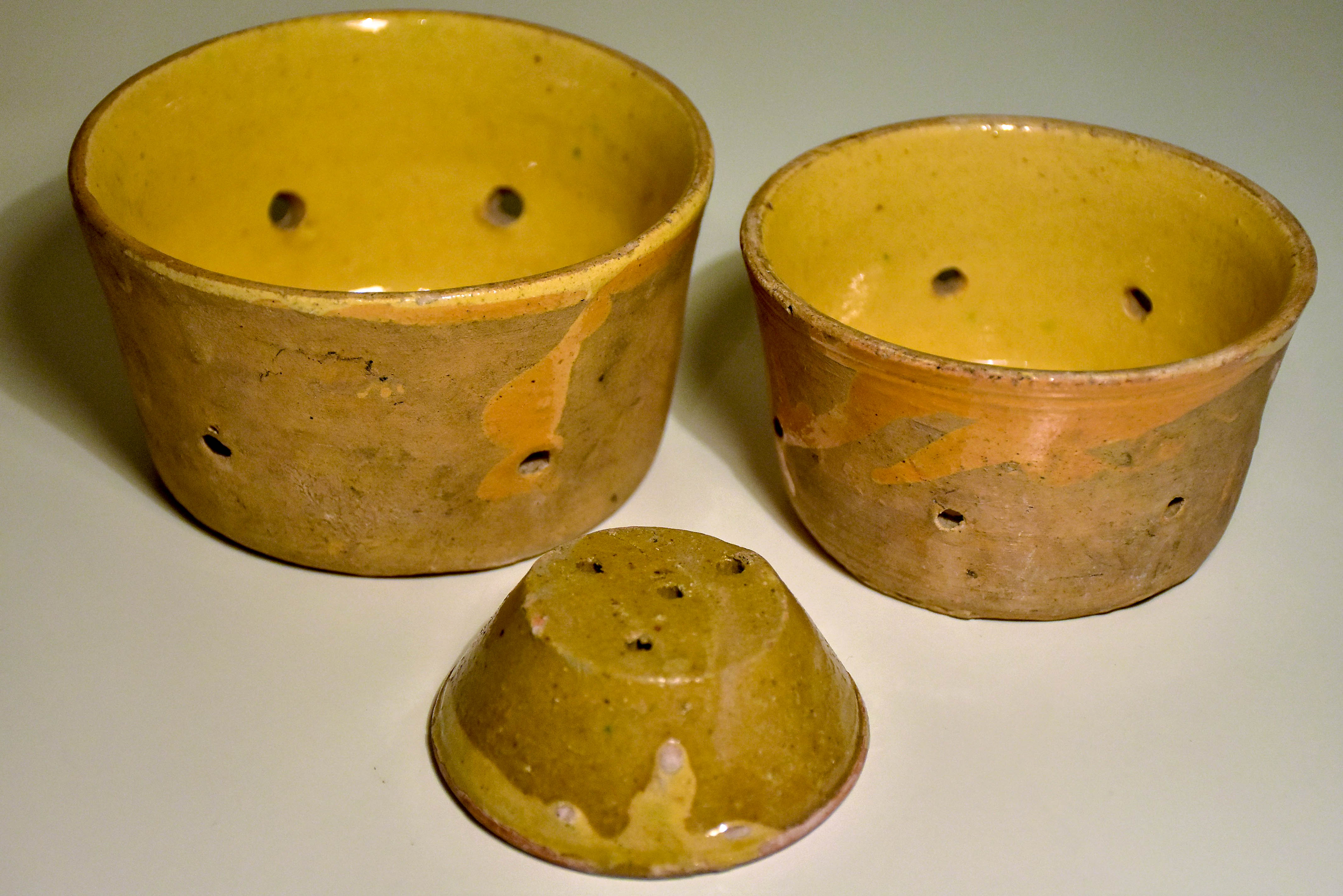 Three antique French cheese molds - 'faisselles'