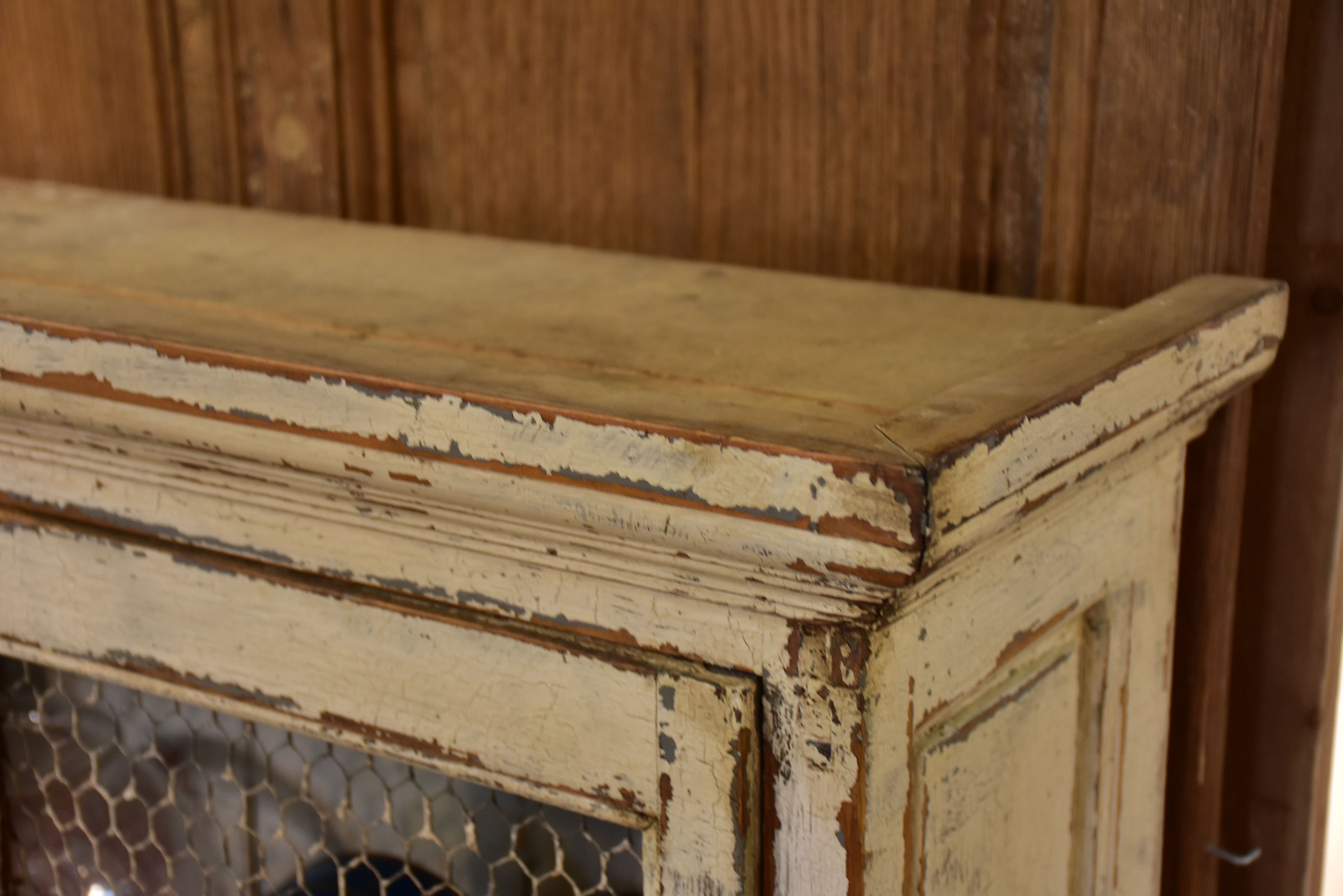 Rustic French armoire with grillwork doors