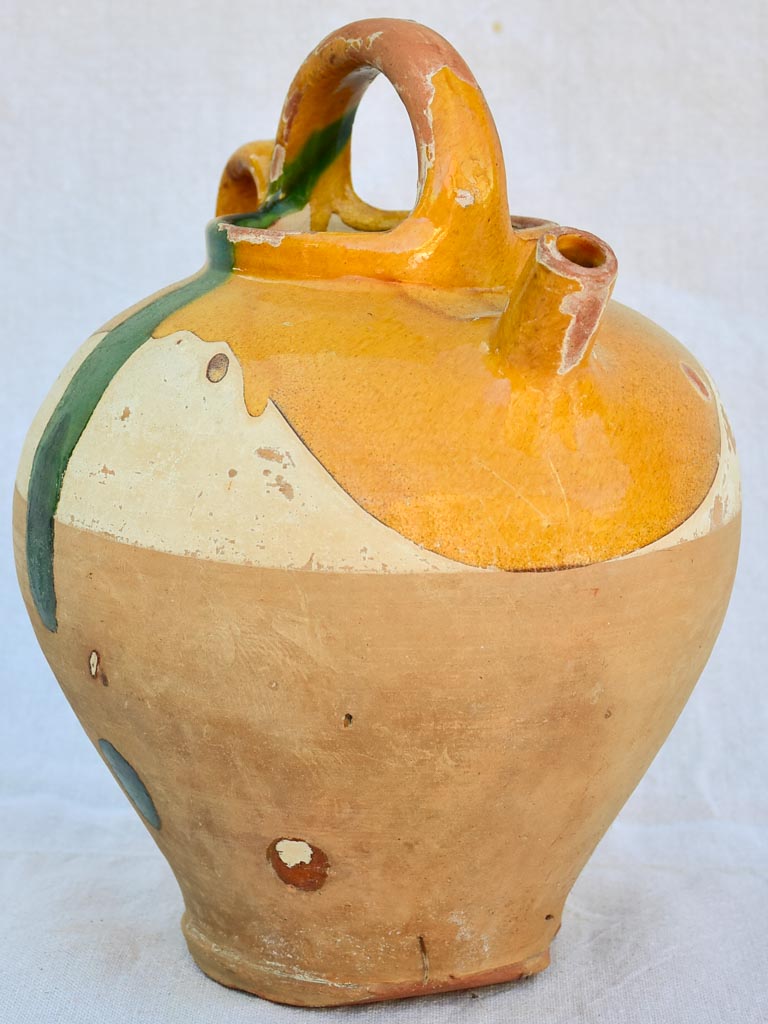 Antique French water pitcher with yellow glaze and green splash 12½"