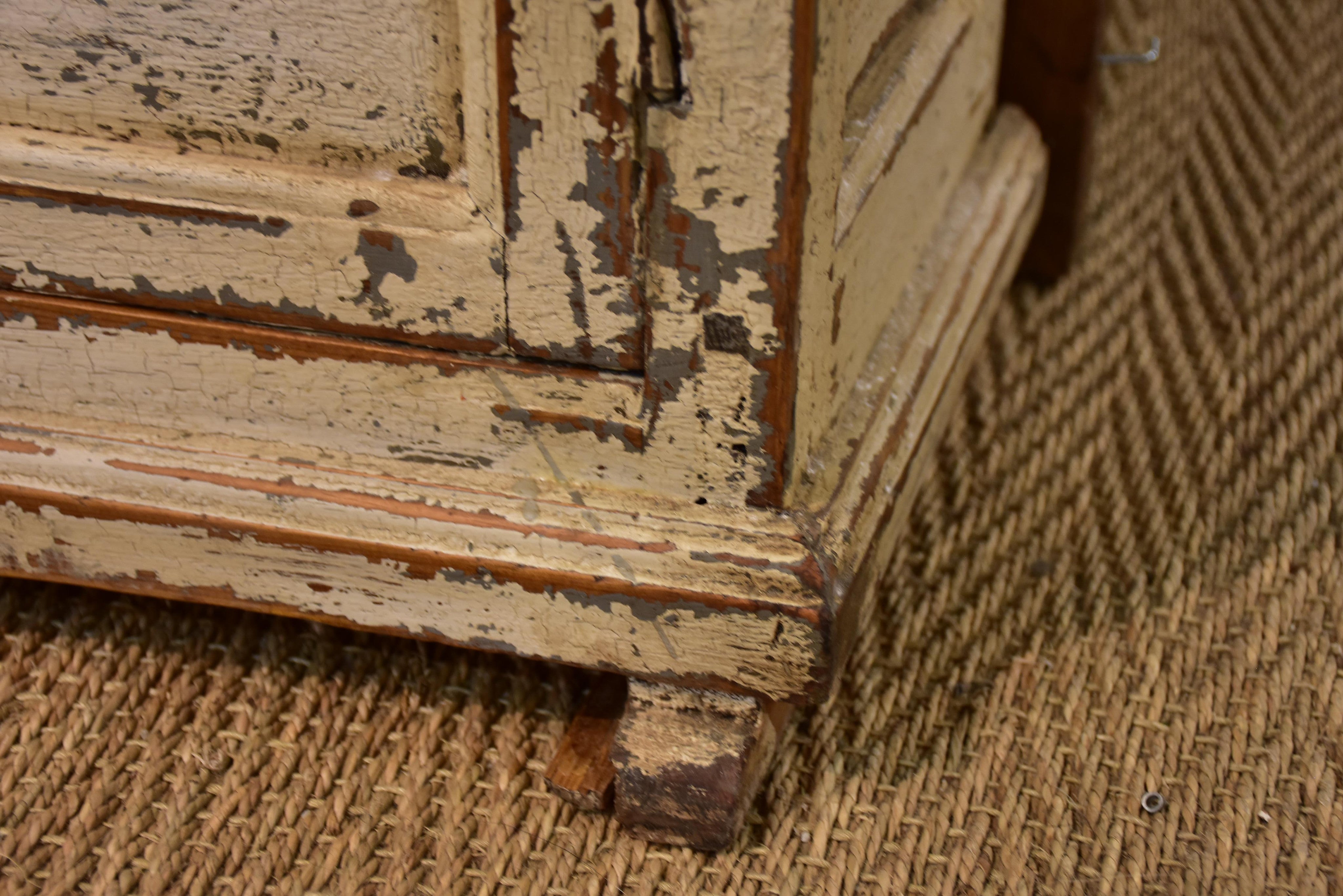 Rustic French armoire with grillwork doors