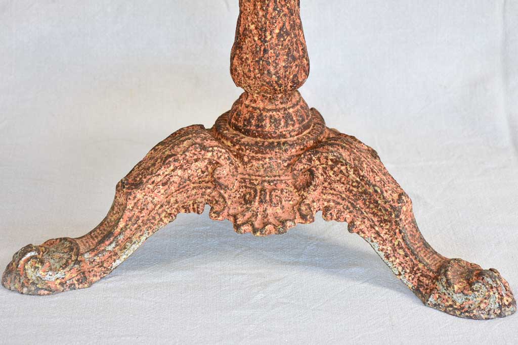 Nineteenth-century French garden table with salmon red patina