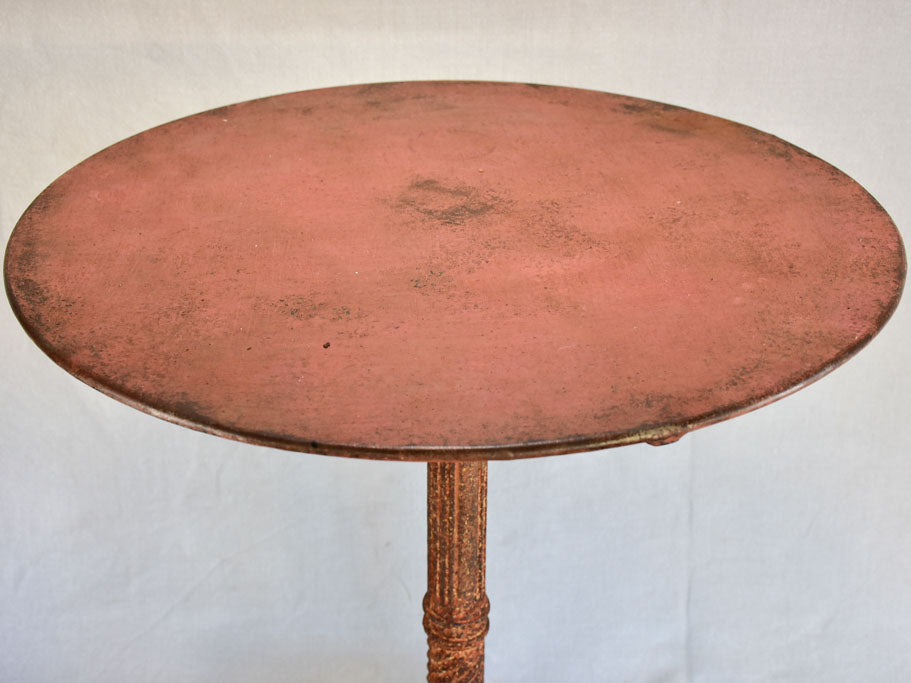 Nineteenth-century French garden table with salmon red patina